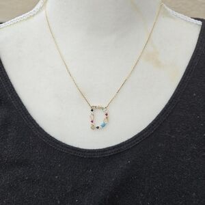 TAI D initial necklace gold tone with precious and semiprecious stones